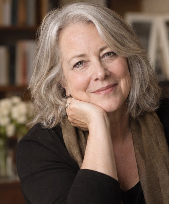 Portrait of a smiling woman with silver hair